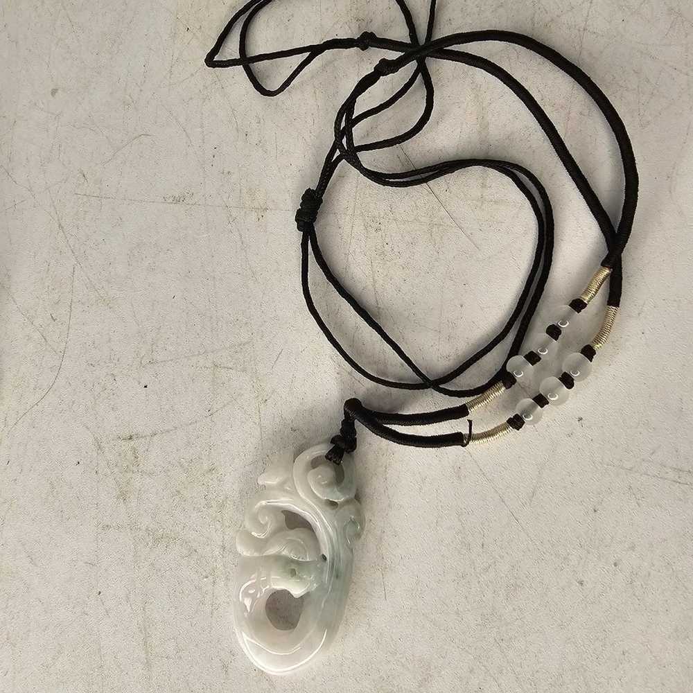 Vintage carved white jade pendant on a black  cord - image 4