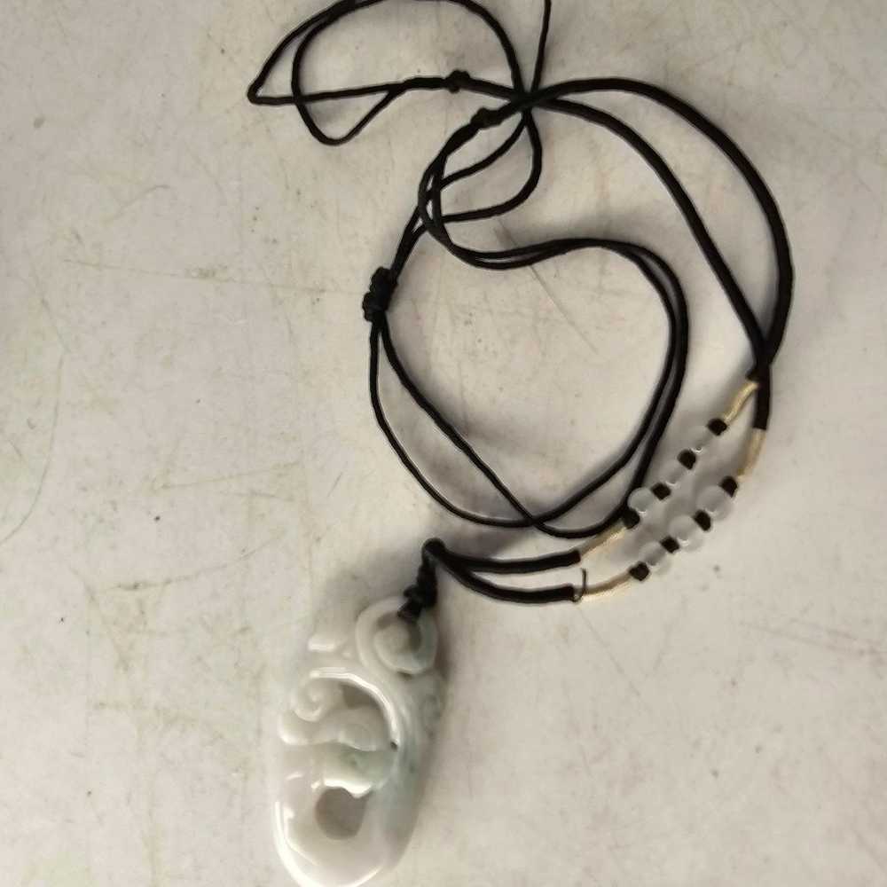 Vintage carved white jade pendant on a black  cord - image 6