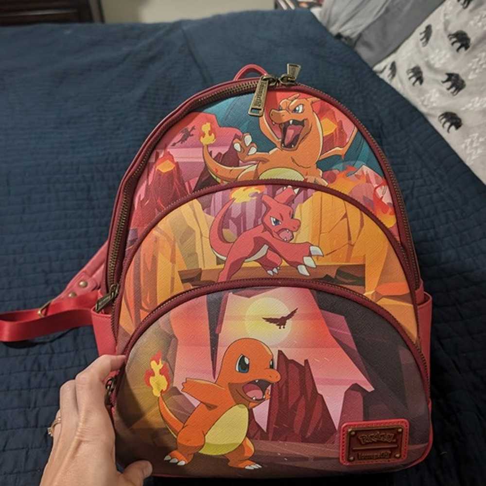 Pokemon Loungefly Charizard Evolutions Triple Zip… - image 1