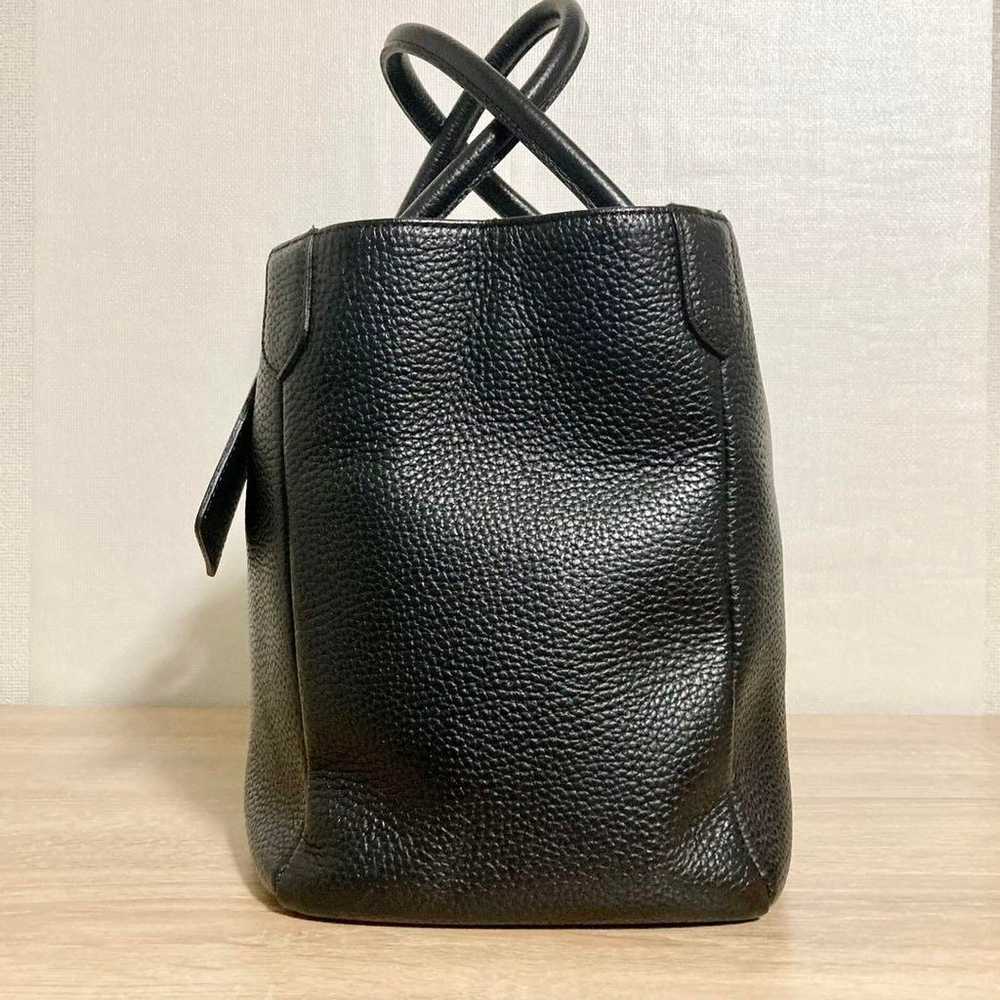 Popular ADMJ leather tote bag in black. - image 3