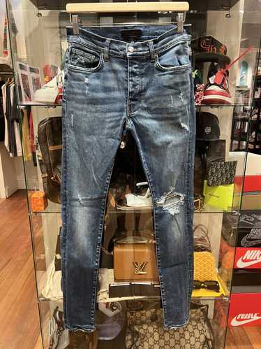 Amiri Amiri distressed indigo denim jeans