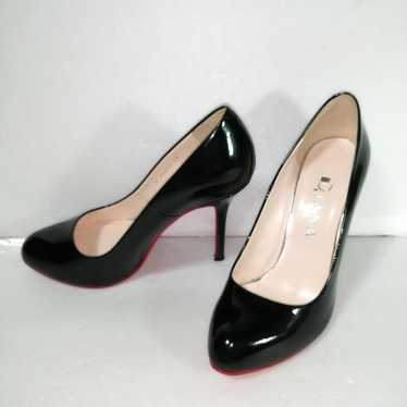 Diana pumps, red sole, patent leather, pin heel.