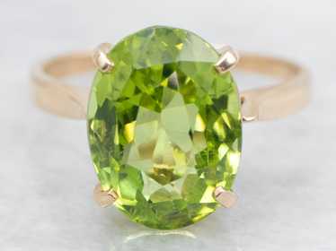 Peridot Solitaire Ring in Four-Prong Setting - image 1