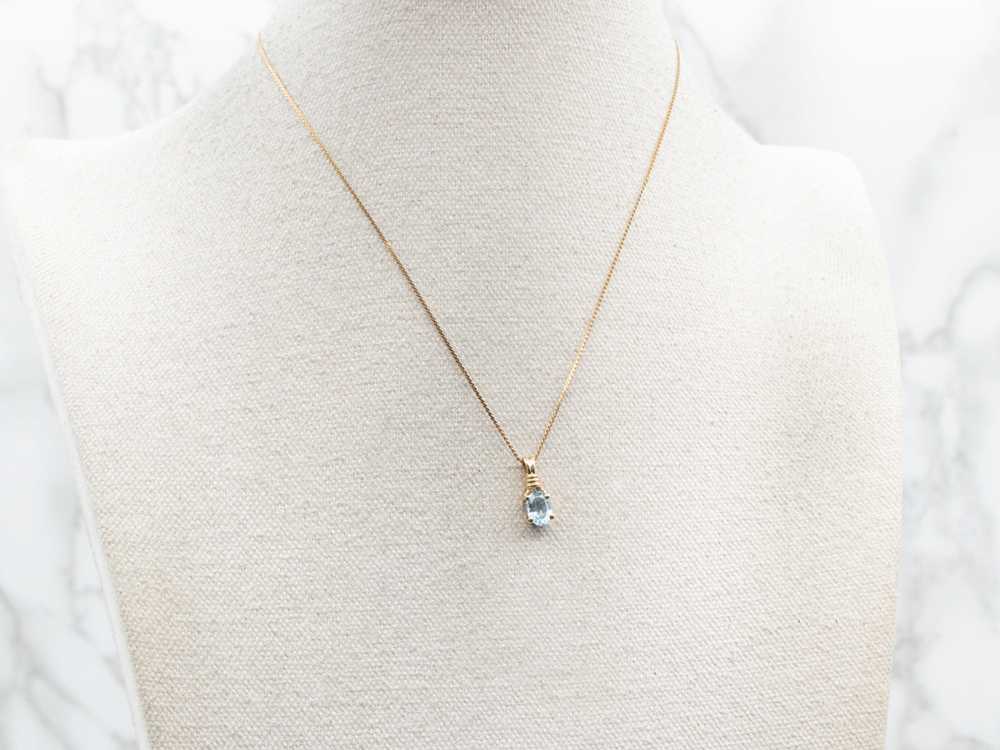 Blue Topaz Solitaire Pendant in Yellow Gold - image 4