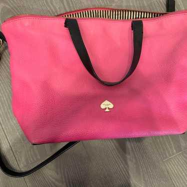 Pink leather shoulder bag.