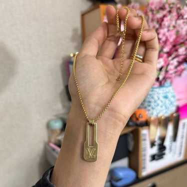 Authentic Louis Vuitton zipper pull necklace