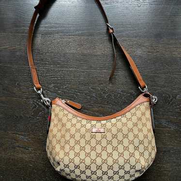 Gucci GG Canvas Medium Half Moon Hobo