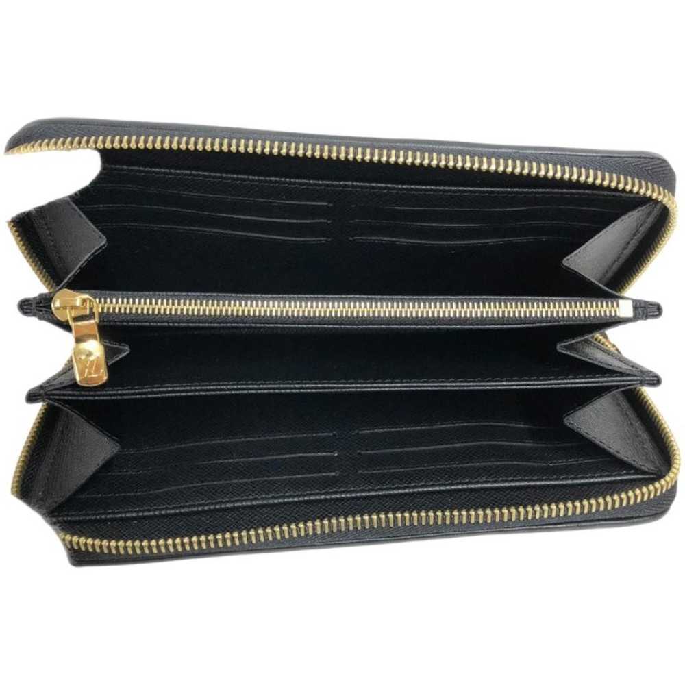 Louis Vuitton Zippy mongolian lamb wallet - image 4