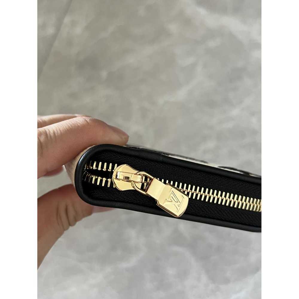 Louis Vuitton Zippy mongolian lamb wallet - image 6