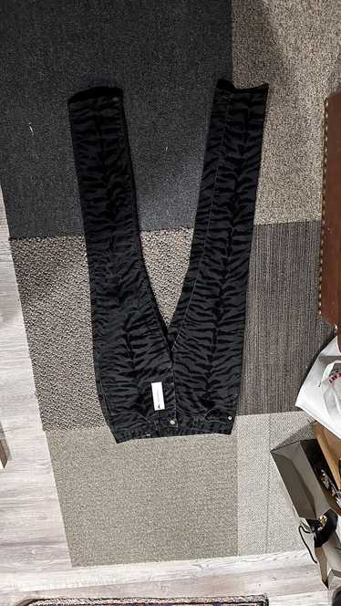 Yves Saint Laurent Black Zebra jeans by ysl size 3