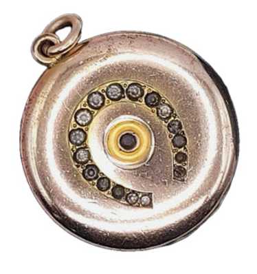 Horseshoe Locket with Evil Eye?