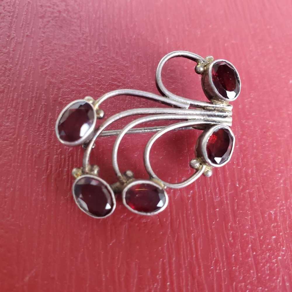 Sterling silver and garnet brooch - image 1