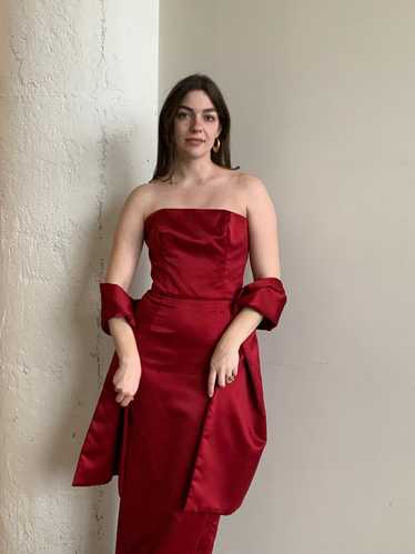 Red satin strapless gown