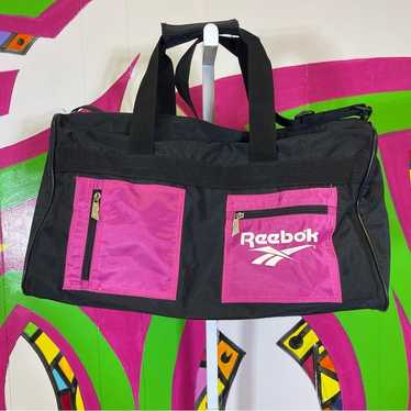 Reebok Black and Pink Duffel Bag. In excellent con