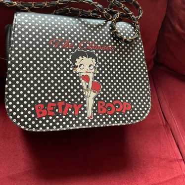 Gorgeous discount collectible and vintage Betty Boop purse and wallet, yellow with white dots, new.