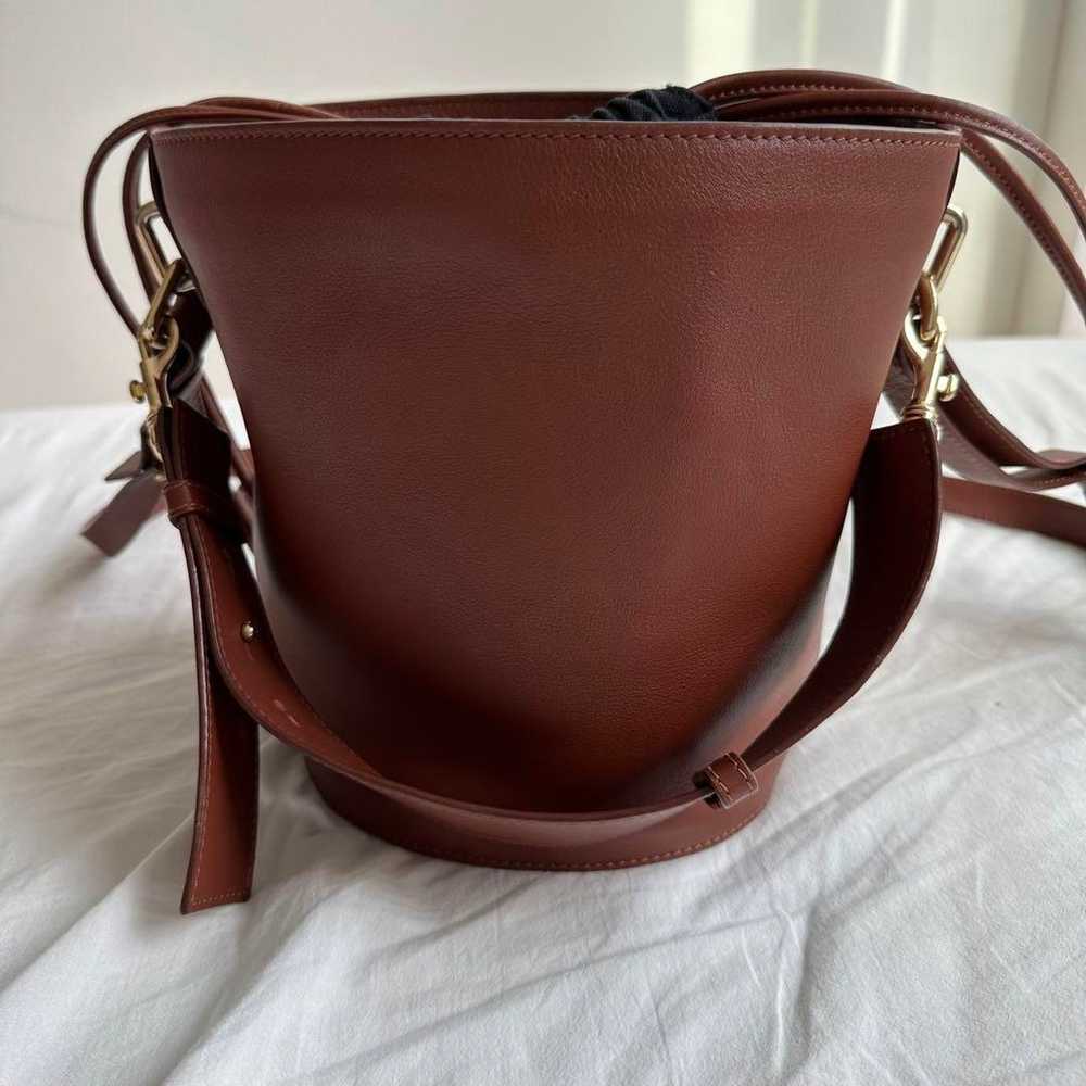 JW Anderson leather bucket bag in brown - image 3