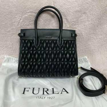 The early bird catches the worm. FURLA black 2-wa… - image 1