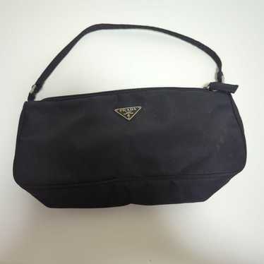 Prada accessory pouch.