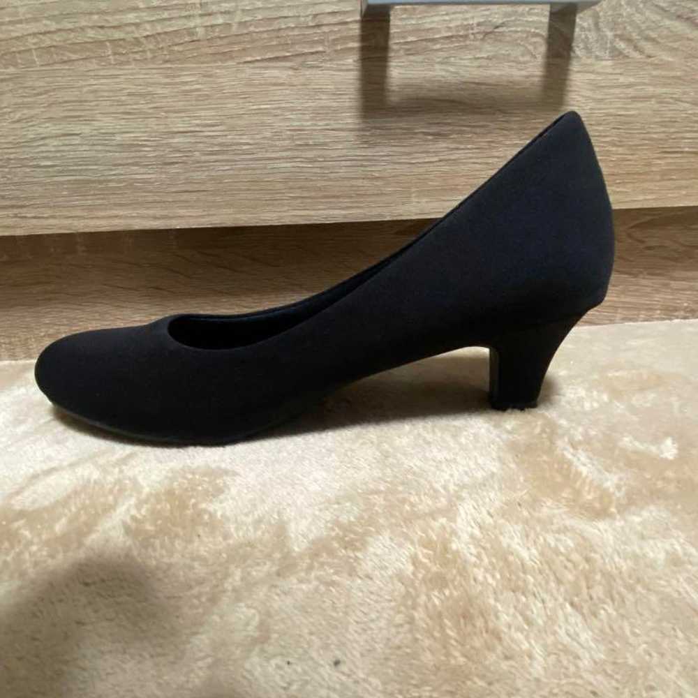 Black slip-on pumps with approximately 5cm heels. - image 2