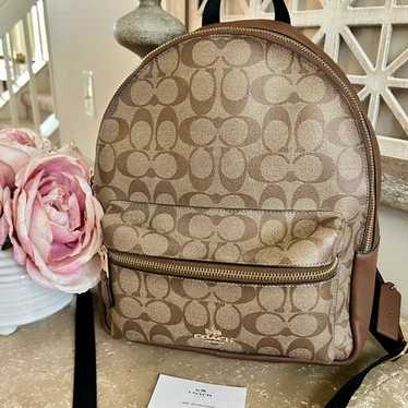 Coach purse Mini Court Backpack in offers Signature Canvas with Fairytale Rose