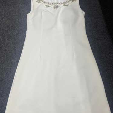 White sleeveless A-line dress - image 1