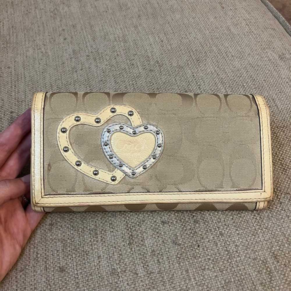 Coach light tan wallet with heart design - image 1