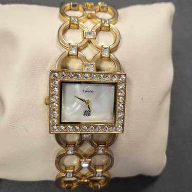 Vintage designer Elizabeth taylor gold tone and cr