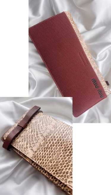 authentic Miu Miu snakeskin leather leather clutch