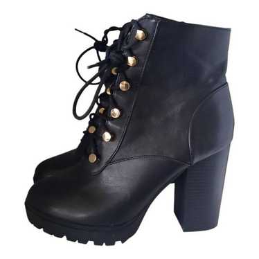 Express Black Ankle Boots with Gold Accents