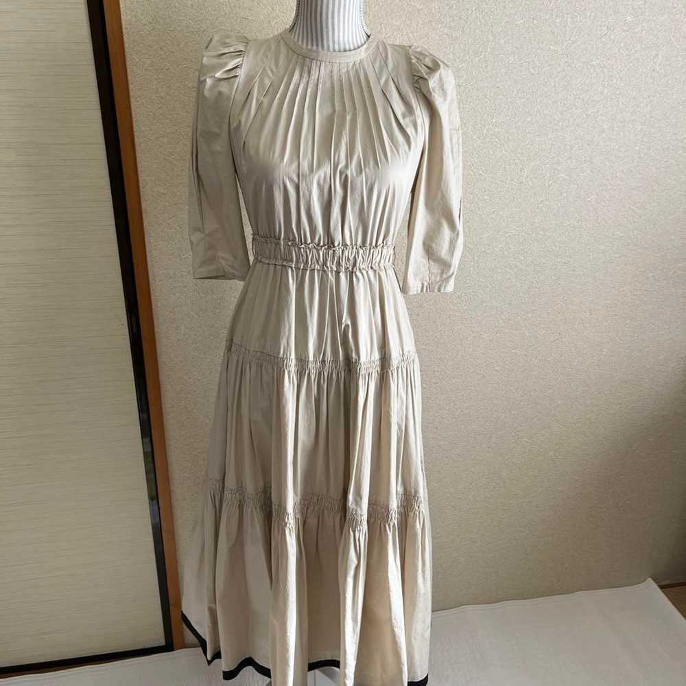 Cream-colored pleated dress - image 1