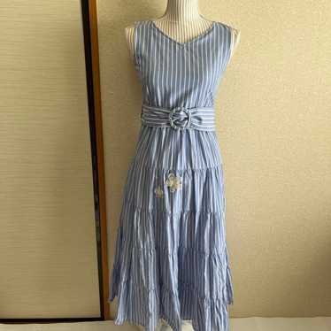 Blue and white striped sleeveless dress.