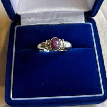 Vintage purple sapphire cabochon silver ring.