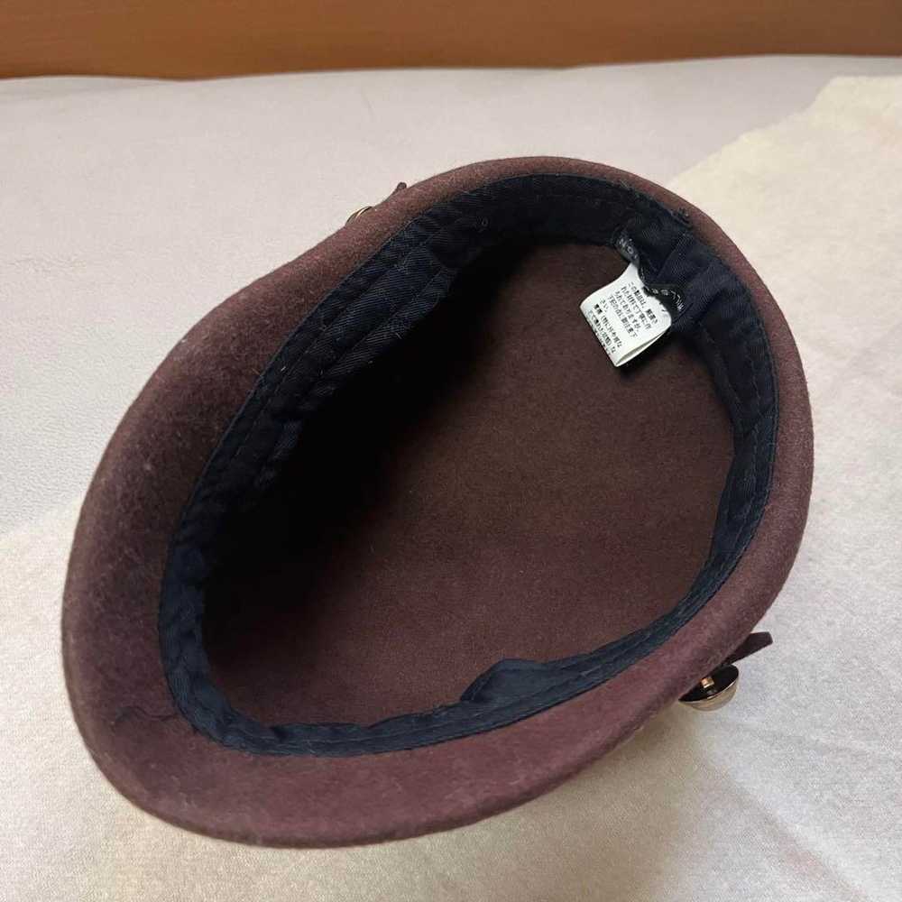 Wool hat with a belt - image 6