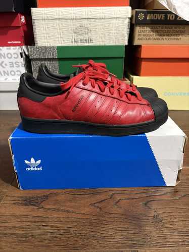 Adidas Red and black camo super stars