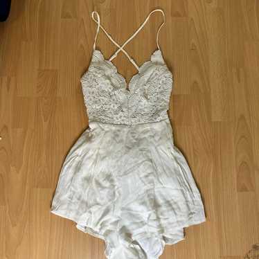 S Lulu’s Cream Romper with Beautiful Lace detailin