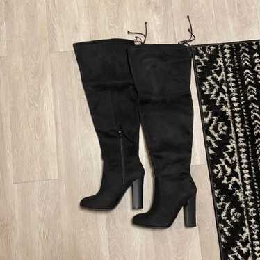 Over the knee high heel boots