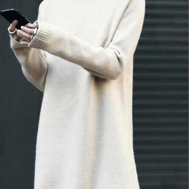 Cream-colored turtleneck knit mini dress