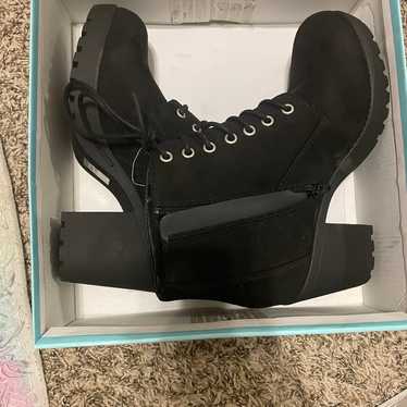 Brand new black boots