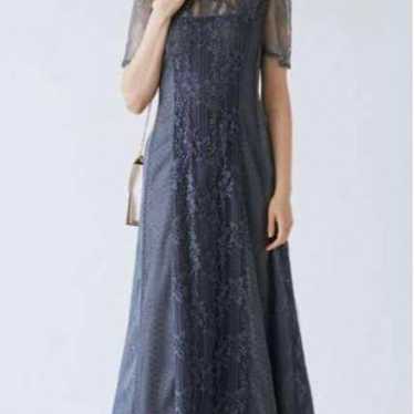 Blue lace maxi dress with short sleeves.