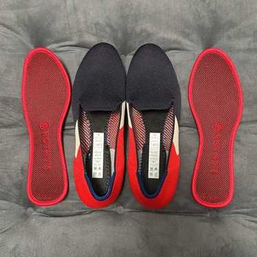 Rothy’s navy, red, and white loafers.