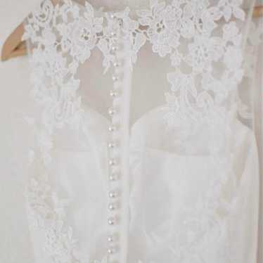 White wedding dress with lace straps