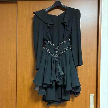 Black party dress with ruffles