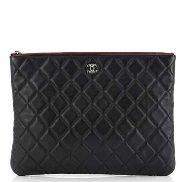 CHANEL O Case Clutch Quilted Lambskin Medium