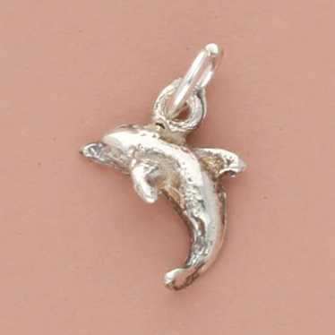 Sterling Silver sterling silver tiny dolphin charm - image 1