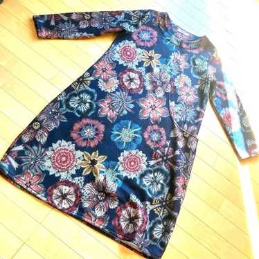 An extremely unique oversized floral print dress.