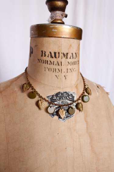 1940s Bakelite Discs & Brass Leaf Necklace