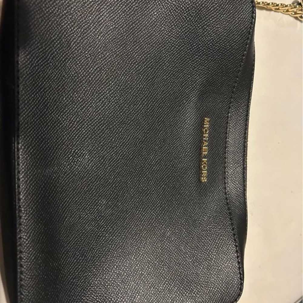 Michael kors jet black leather purse - image 1