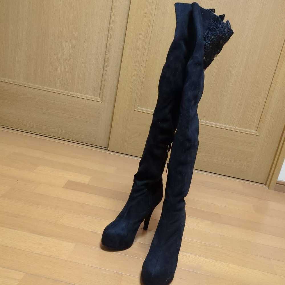 Black suede long boots with high heels. - image 1