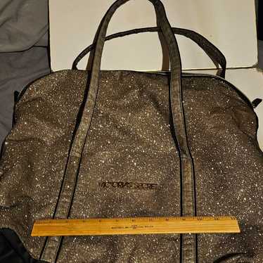 Victoria’s Secret gold and black bag