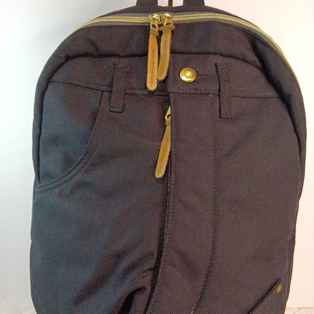 Merci Beaucoup's denim-style backpack. - image 2